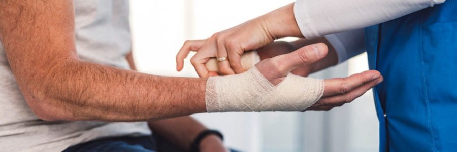 bandaging-broken-hand-in-hospital